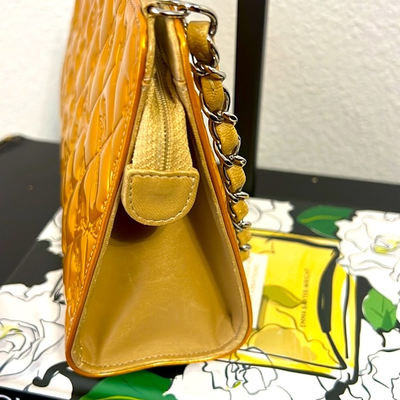 CHANEL Lucky Symbols Pochette Embossed
Quilted Patent (gold) with COA - Picture 7 of 9